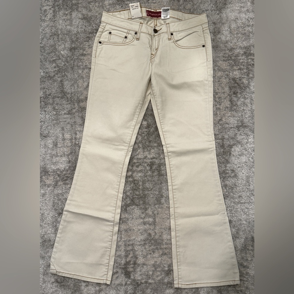 Levi’s TOO SUPERLOW STRETCH Boot Cut Cream Denim. Size 9 Juniors M
